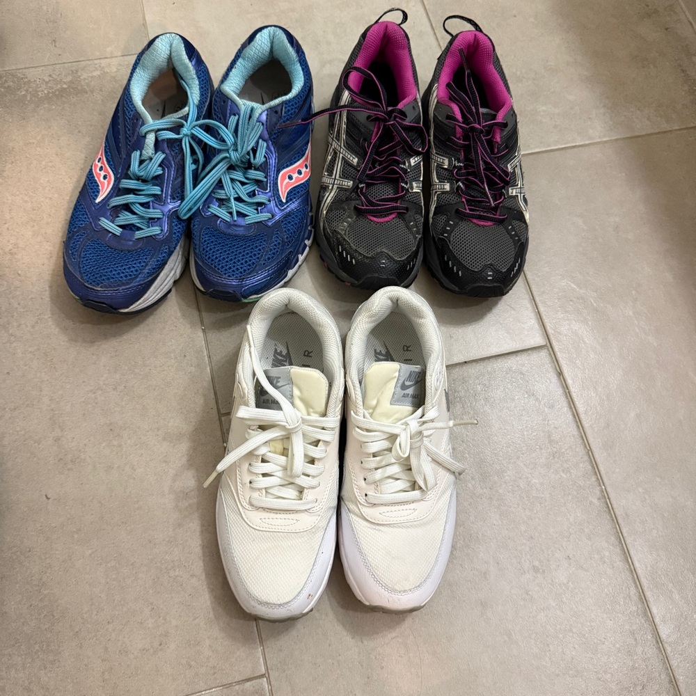 Athletic running shoes Nike Asics